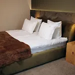 & Hotel *